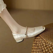 Claribel Pearl Pumps